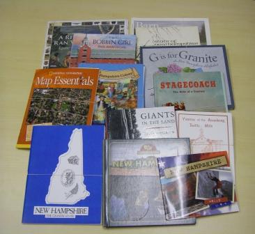 a collection of about 15 books about the state of NH