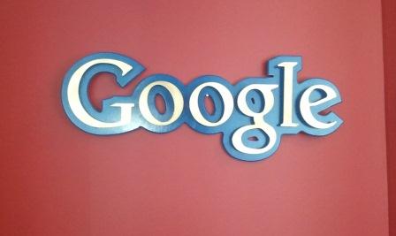 Image of the Google logo on a red background. 