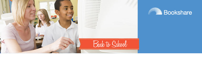 Image of a teacher and student in front of the computer with words "Back to School"