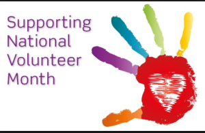 Image is a hand of many colors and the text Supporting National Volunteer Month