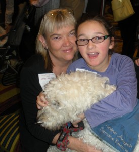 Elina and her mom Karla, and their guide dog, Zoe