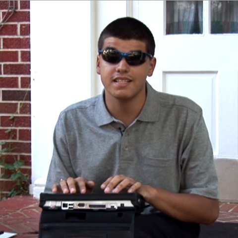 Curtis uses a braille device.