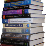 Stack of textbooks.