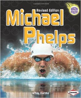 Book Cover of Michael Phelps by Jeffrey Zuehlke with photo of Michael swimming butterfly