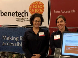 Amaya and McKenzie, Benetech staff, in the Benetech booth at a conference