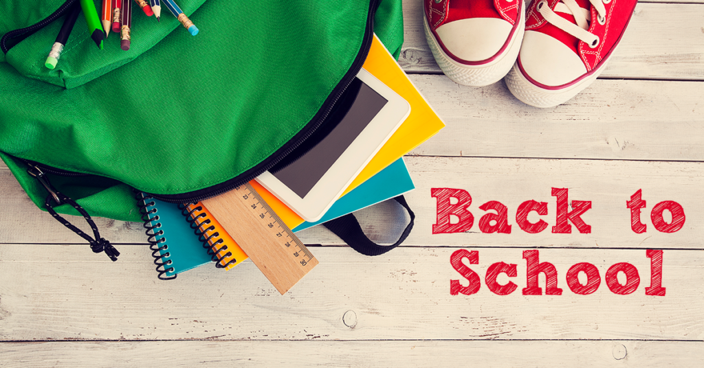 backpack with school supplies spillout out and Back to School caption